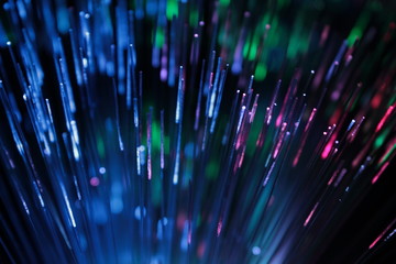 Abstract view of multicolor optical fibers as a background