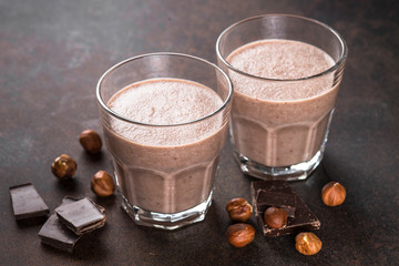 Chocolate hazelnut milkshake or smoothie in two glasses.