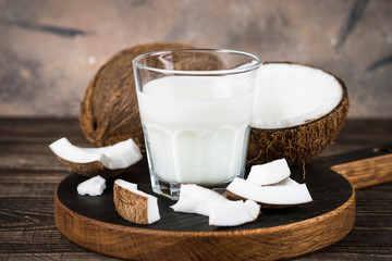 Coconut milk in glass, Vegan milk.