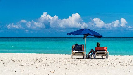 Chairs And Umbrella In Palm Beach - Tropical Holiday Banner
