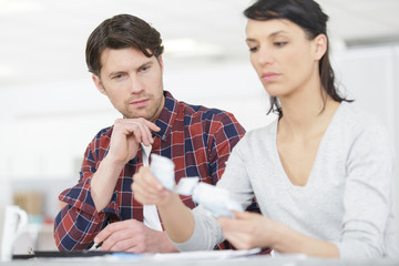 couple unpacking at new home