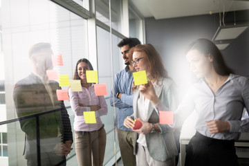 Business people meeting at office and use post it notes to share idea