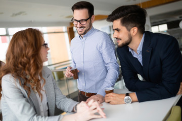 Group of attractive business people on coffee break