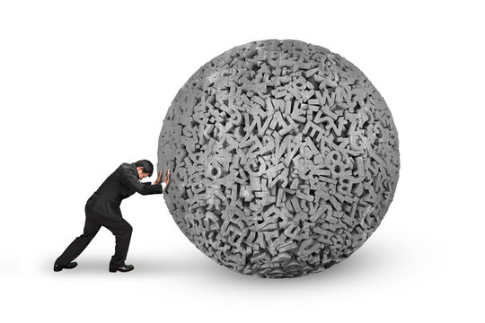 Big data concept. Businessman pushing gray concrete ball of huge amount 3d letters and numbers, isolated on white background.