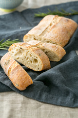 Slices of freshly baked traditional italian bread ciabatta, close up