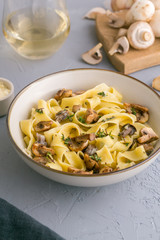 Tagliatelle pasta with mushrooms, close up