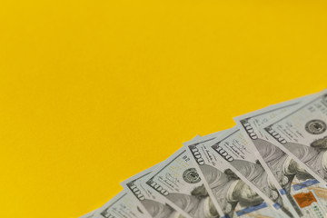 American Dollars Cash Money. 100 dollars banknotes in the background.