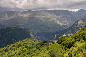 Obraz premium The majestic mountains on a cloudy day (region Tzoumerka, Epirus, Greece)