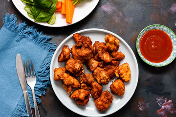 Chicken sixty five, a spicy fried chicken dish in India, Singapore and Sri Lanka.