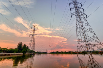 electricity pylons at sunset