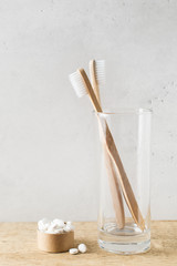 Zero waste, sustainability and minimalism concept. Wooden ecological bathroom accessories on white background