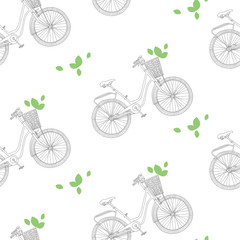 Green leaves and hand drawn pattern of bicycle. Vintage bike with basket on white isolated background. Vector illustration