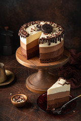 slice of no baked layered cheesecake Three Chocolates