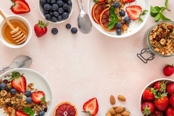 Healthy breakfast concept. Food background with homemade granola, honey, yogurt and fresh berries.