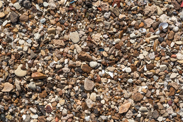 Small river gravel, background - beautiful natural texture with small pebbles, macro