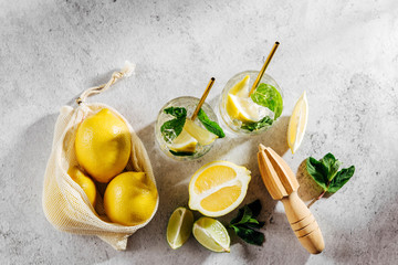 Fresh citrus lemonade with limes, lemons and mint. Summer drinks.  .