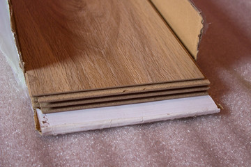 Packaged laminate on the floor,Packing with a wooden laminate for floor installation