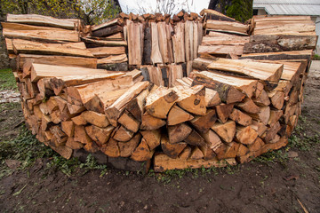 round wood pile in middle stage