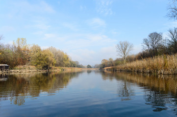 Beautiful landscape photo of Holt-Tisza river and riverside in Hungary. Autumn forest morning fog. Best place for fishing.