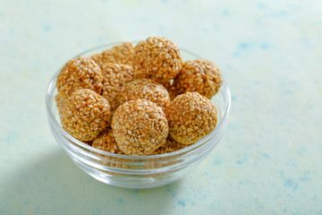 Pile of handmade Tilgul Laddu , sesame seeds for Makar Sankranti festival,