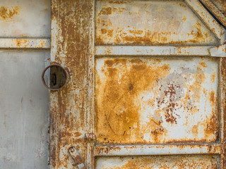 the background image of a rusty door and a padlock