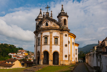 Ouro Preto, Minas Gerais, Brazil: The famous Church of Saint Francis of Assisi, a Rococo Catholic church in Ouro Preto, Brazil in a cloudy sky day