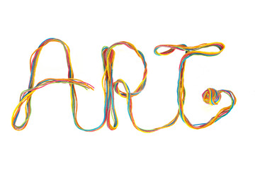 Word ART made of colorful thread isolated on white background.  ART of cotton thread with thread ball.