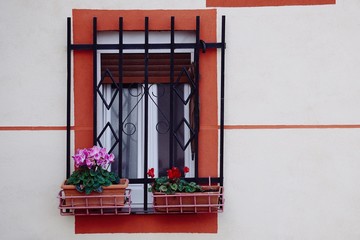 Fototapeta na wymiar window on the white building facade in Bilbao city Spain