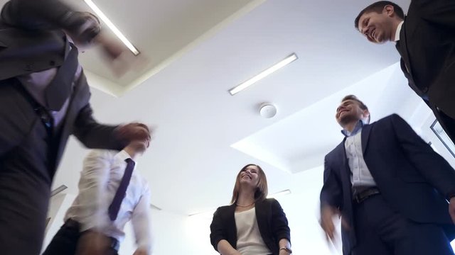 Business people group joining hands for friendship and teamwork concept.