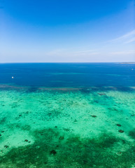 Aerial view coral reef tropical caribbean sea, turquoise blue water. Indonesia Moluccas archipelago, Kei Islands, Banda Sea. Top travel destination, best diving snorkeling.