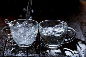 water splash in glass cup