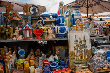 Sale of handicrafts on a public market on the street. City of Ouro Preto in Minas Gerais, Brazil.
