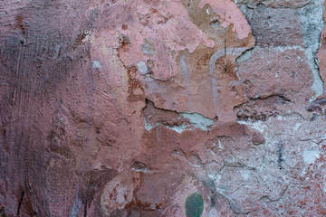 The concrete texture, wall, with cracks and scratches can be used as a background