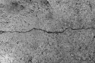 Obraz premium The concrete texture, wall, with cracks and scratches can be used as a background