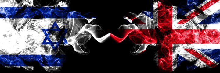 Israel vs United Kingdom, British smoky mystic flags placed side by side. Thick colored silky smokes flag of Israel and United Kingdom, British