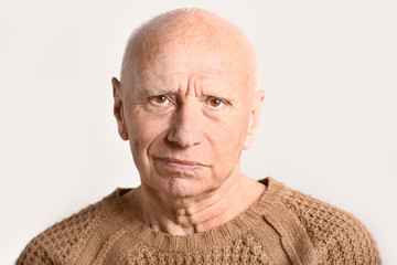 Obraz premium Portrait of senior man on white background