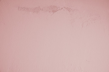 Rosa, violett, pink, Pastell, Betonwand mit schmutziger, alter, rauer Struktur im oberen Teil des Bildes. Steinwand, Zementwand im Industrial Style als Hintergrund, Tapete, Gestaltungselement, Kunst