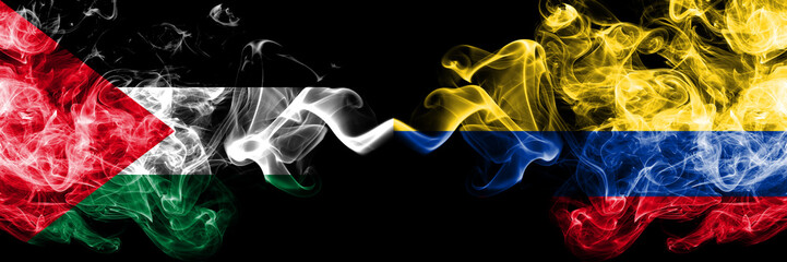 Palestine vs Colombia, Colombian smoky mystic flags placed side by side. Thick colored silky smokes flag of Palestinians and Colombia, Colombian