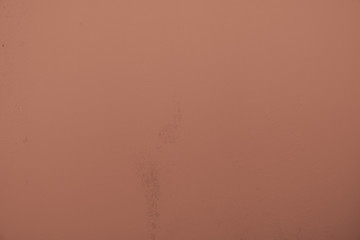 Copper-colored background with slightly scratched structures