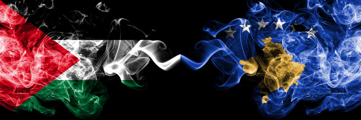 Palestine vs Kosovo, Serbia smoky mystic flags placed side by side. Thick colored silky smokes flag of Palestinians and Kosovo, Serbia