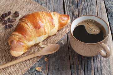 Croissant and cup of coffee