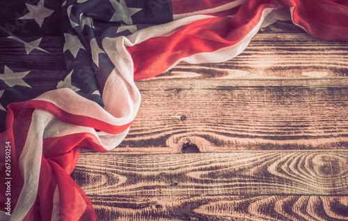 Patriotic symbols. American flag on an old wooden background.