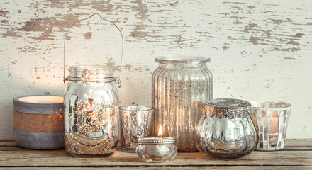 home decor. different vases on wooden background