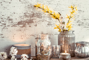 Home decor on wooden background with spring flowers