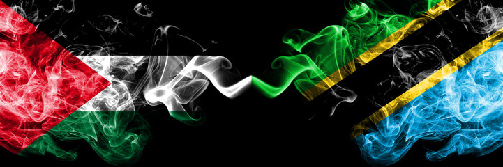 Palestine vs Tanzania, Tanzanian smoky mystic flags placed side by side. Thick colored silky smokes flag of Palestinians and Tanzania, Tanzanian