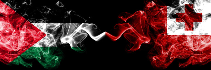 Palestine vs Tonga, Tongan smoky mystic flags placed side by side. Thick colored silky smokes flag of Palestinians and Tonga, Tongan