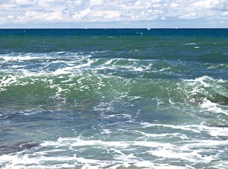 The peninsula of Crimea and Black sea. Emerald and pearl color of Black sea waves. The wild coast...