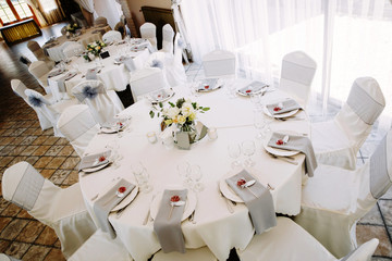 Table setting at a wedding hall. Modern event design. Upper view.