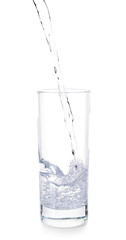 Pouring of fresh water into glass on white background