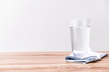 Glass of fresh water on table